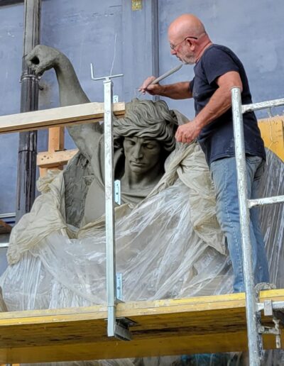 Sergey Eylanbekov designed and made monumental bronze statues of St. Michael the Archangel and St. Florian for the façade of the newly built Quincy Public Safety Headquarters building.